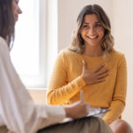 Psychologist listening to her patient